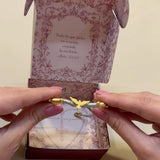 PULSERA EN HILO CON EL ESPÍRITU SANTO